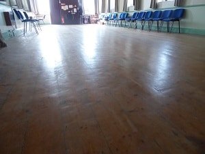 DIY attempt at sanding a wooden hall floor in a village outside of Barrow In Furness